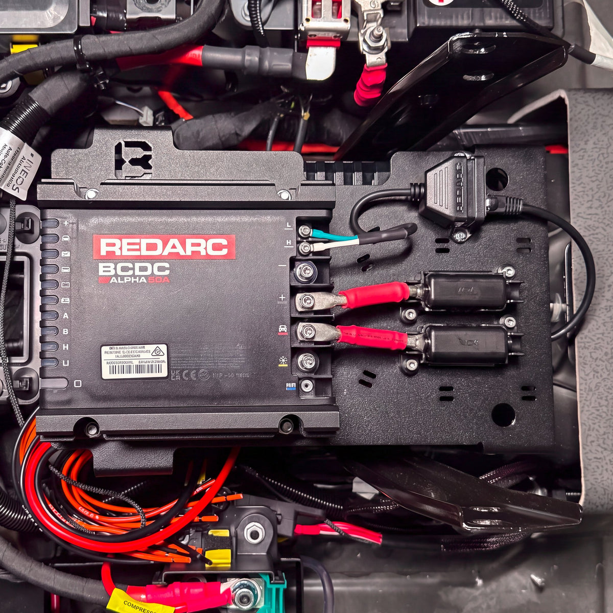 REDARC Alpha50 R under-seat mount fitted in an INEOS Grenadier by Buzz Overland