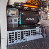 Buzz Overland rear window MOLLE panel with REDARC Power Plate and RedVision display in an INEOS Grenadier