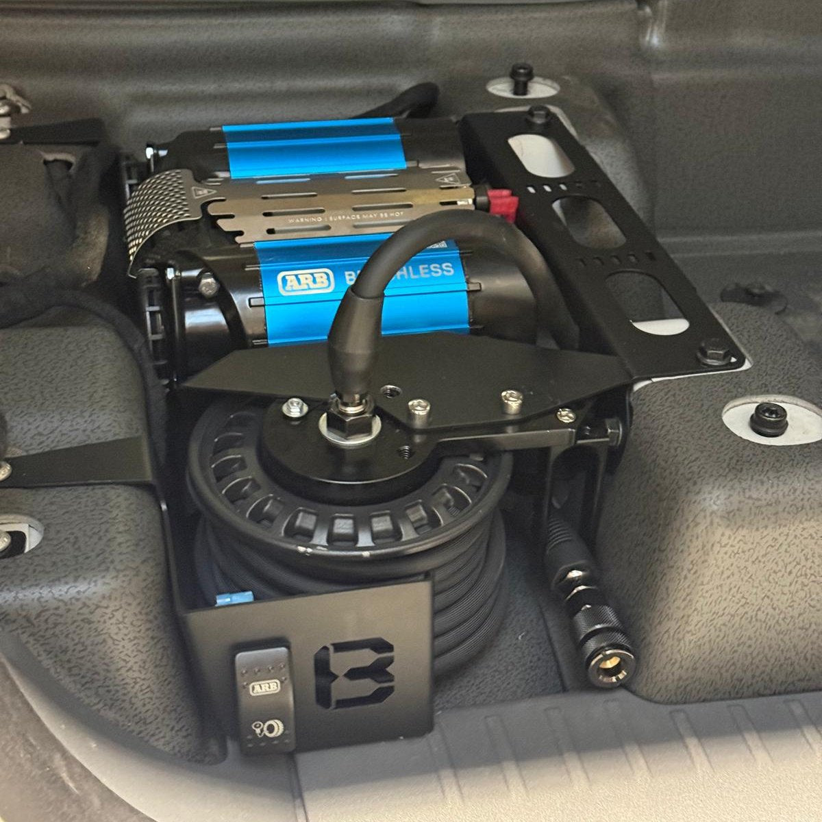 Grenadier onboard air mount with rocker switch and quick-connect air outlet (ARB Brushless shown)