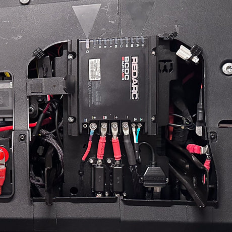 REDARC BCDC Alpha50 R wired in on the Buzz Overland under-seat bracket in an INEOS Grenadier